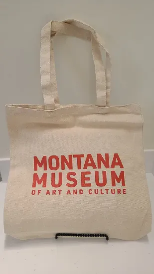 canvas cotton tote bag with Montana Museum of Art and Culture screen printed in red on it