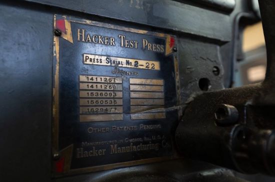 metal plate on the side of printing press reading hacker test press patent numbers and other information